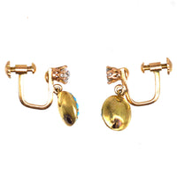 Early 20th century gold earrings with diamond and pavé turquoise dangling discs, circa 1910s.