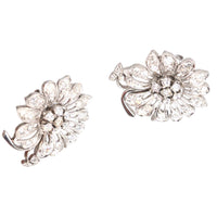 1940s 18ct white gold flower cluster earrings with diamond petals and central diamonds, showcasing vintage elegance.