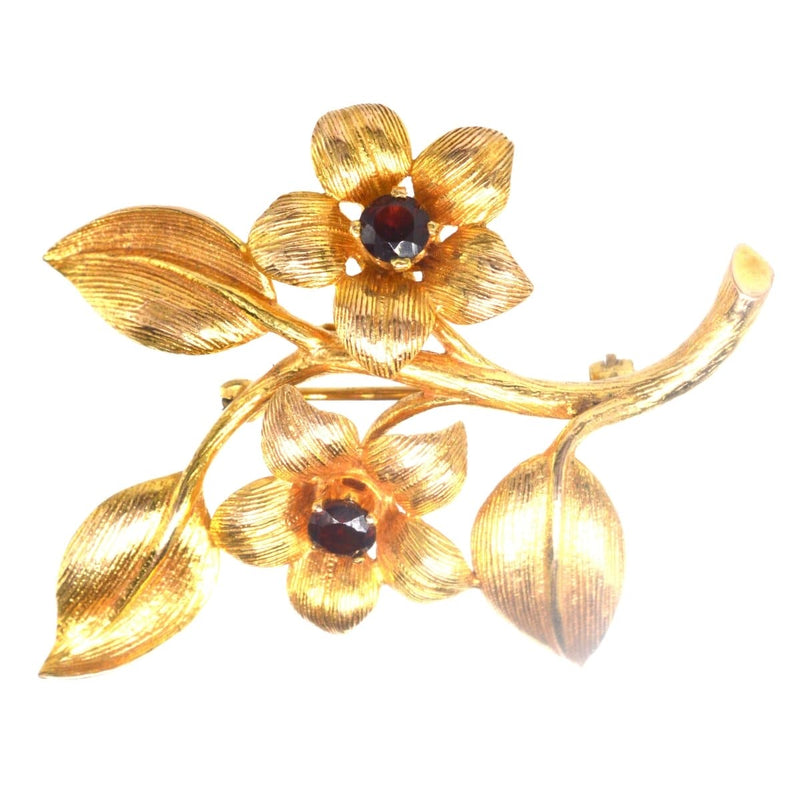 Broche florale en or 9 carats et grenat des années 1960