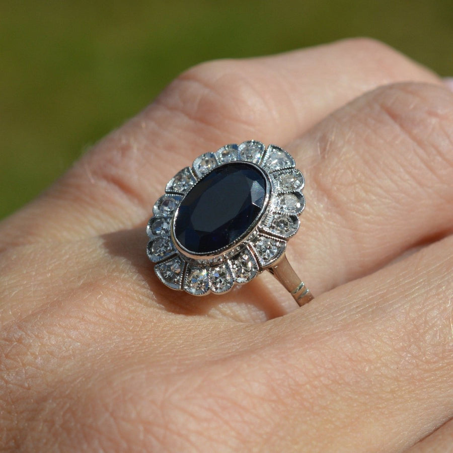 Early 20th Century Dark Blue Sapphire and Diamond Cluster Ring | Parkin and Gerrish (UK)