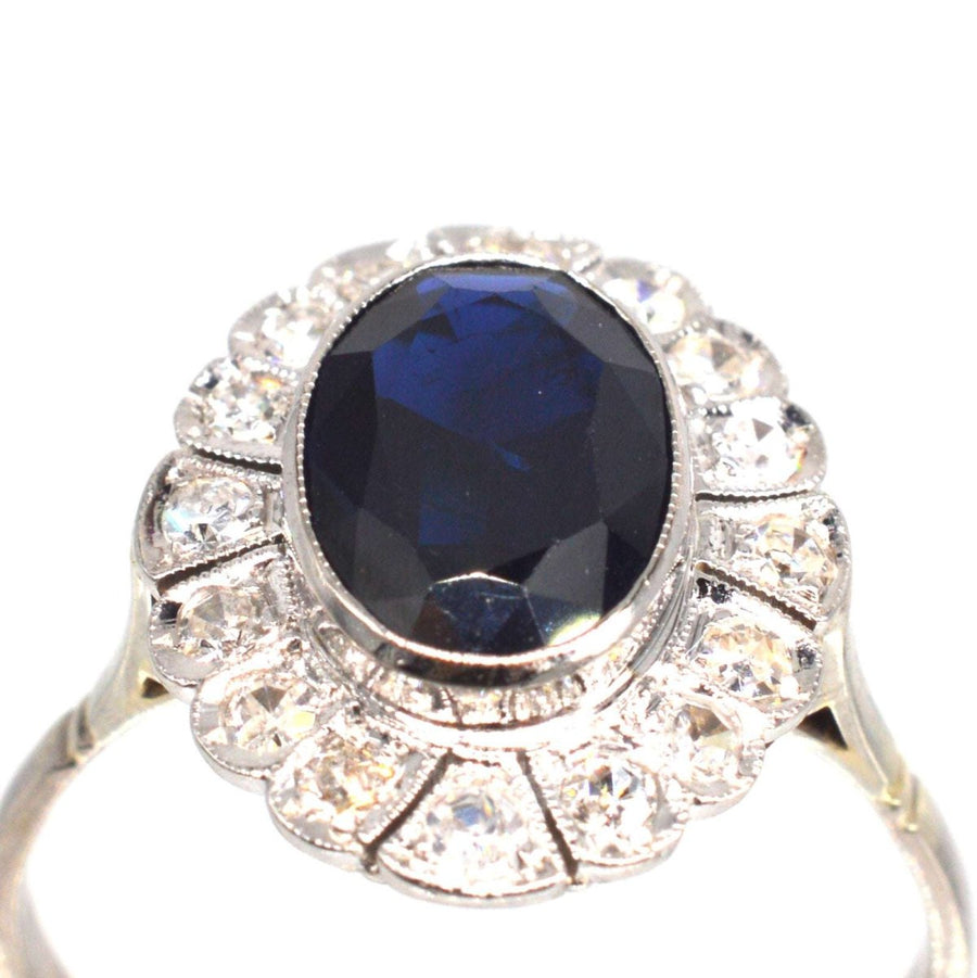 Early 20th Century Dark Blue Sapphire and Diamond Cluster Ring | Parkin and Gerrish (UK)