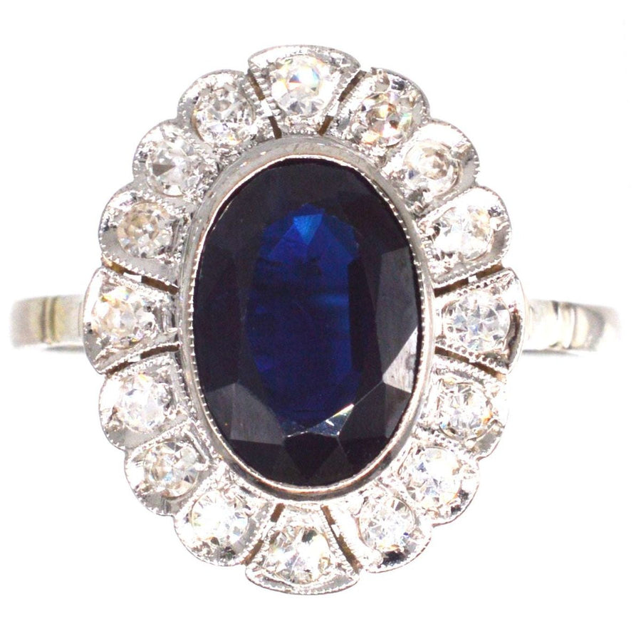 Early 20th Century Dark Blue Sapphire and Diamond Cluster Ring | Parkin and Gerrish (UK)