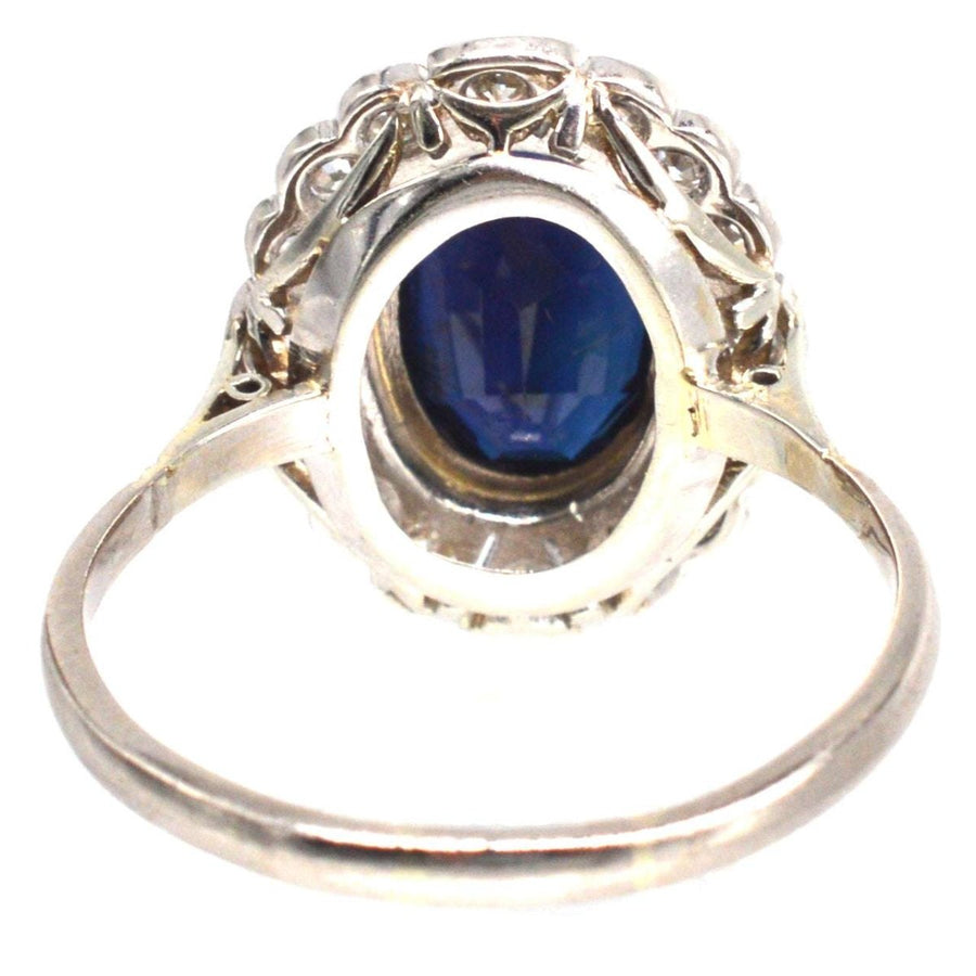 Early 20th Century Dark Blue Sapphire and Diamond Cluster Ring | Parkin and Gerrish (UK)