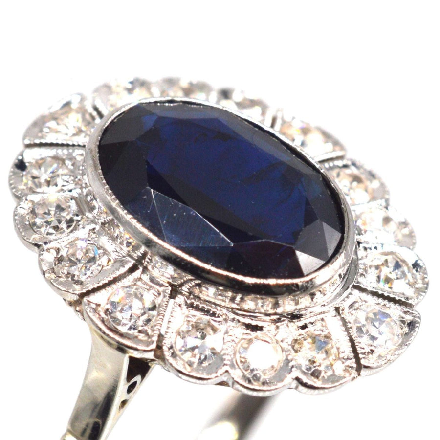 Early 20th Century Dark Blue Sapphire and Diamond Cluster Ring | Parkin and Gerrish (UK)