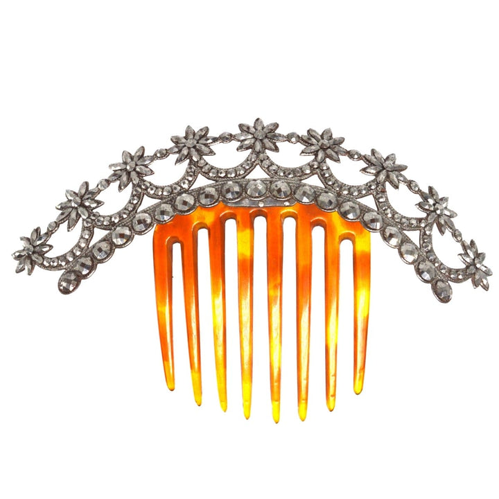 Regency cut steel tiara with stars and tortoiseshell comb, featuring intricate floral design and sparkling detail.