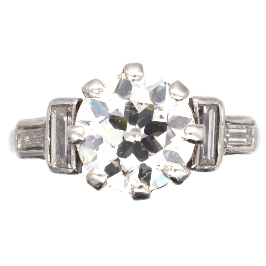 Large Art Deco Platinum 3 Carat Old European Cut Diamond Solitaire Ring with Baguette Diamond Shoulders | Parkin and Gerrish | Antique & Vintage Jewellery