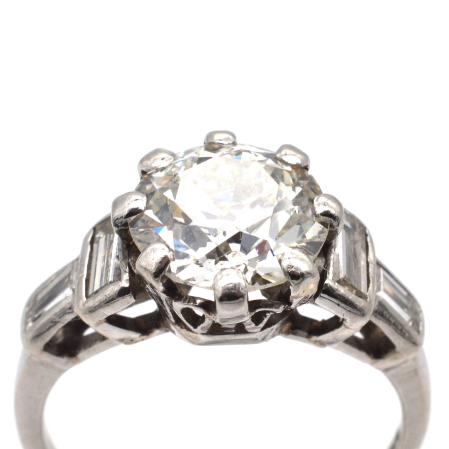 Large Art Deco Platinum 3 Carat Old European Cut Diamond Solitaire Ring with Baguette Diamond Shoulders | Parkin and Gerrish | Antique & Vintage Jewellery