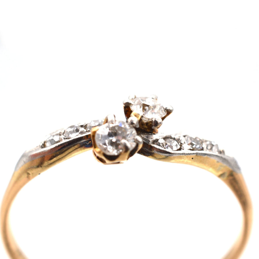 Edwardian 18ct Gold & Platinum, Two Stone Diamond Crossover Ring with Diamond Shoulders | Parkin and Gerrish | Antique & Vintage Jewellery