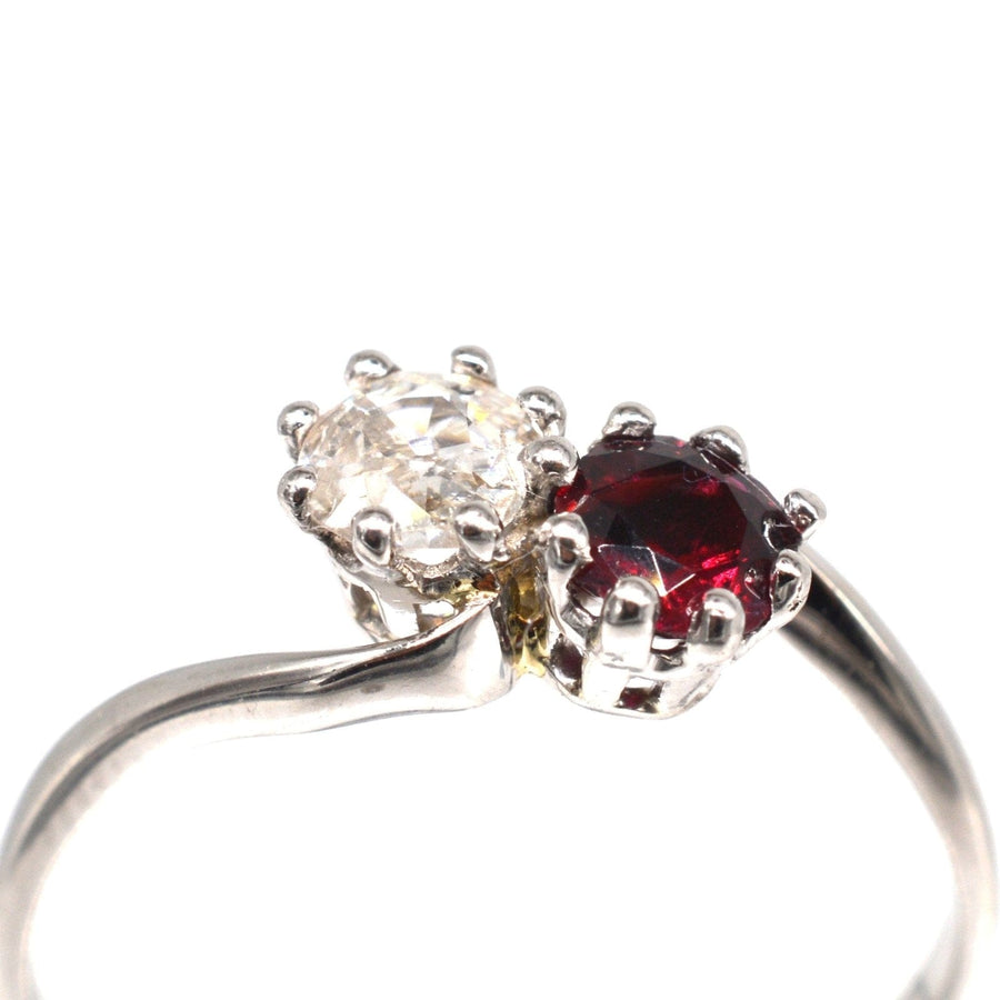 Edwardian Platinum, Ruby and Old Mine Cut Diamond Two Stone 'Toi et Moi' Crossover Ring | Parkin and Gerrish | Antique & Vintage Jewellery