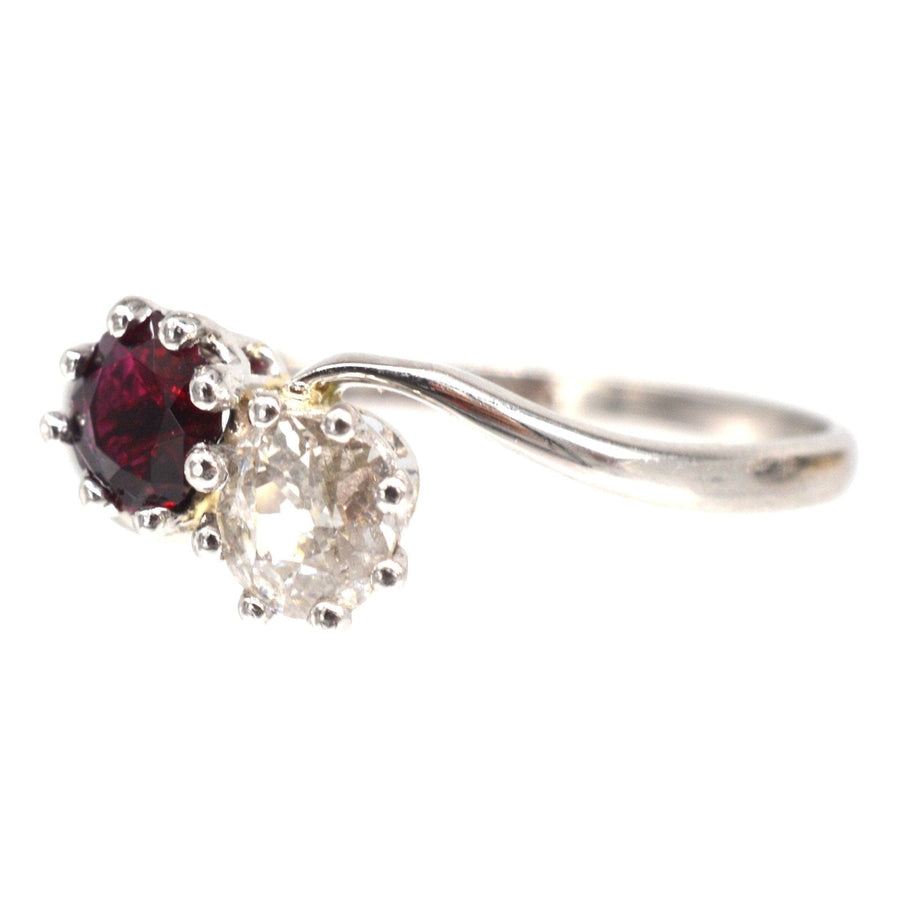 Edwardian Platinum, Ruby and Old Mine Cut Diamond Two Stone 'Toi et Moi' Crossover Ring | Parkin and Gerrish | Antique & Vintage Jewellery